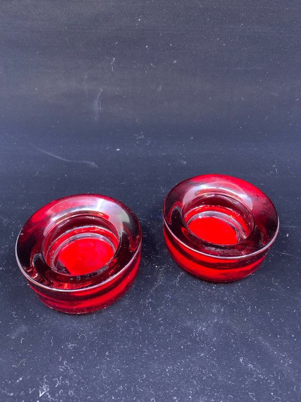 2 ROUND TEA LIGHT HOLDERS.