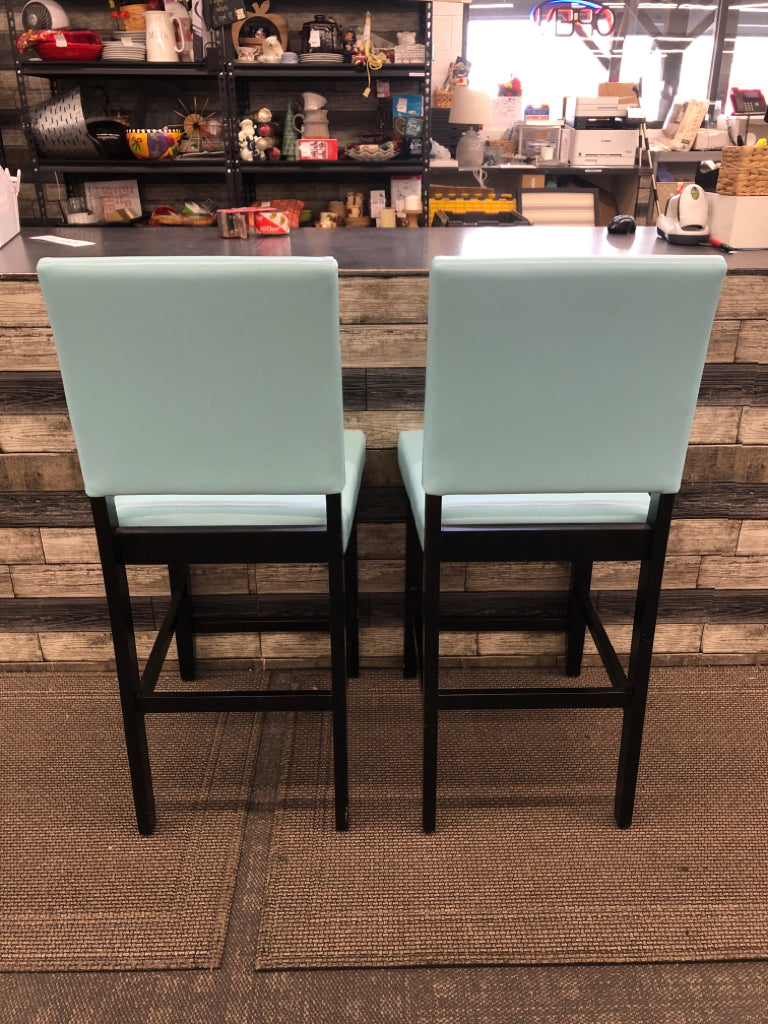 2 AQUA FAUX LEATHER BAR STOOLS W/ BLACK LEGS.