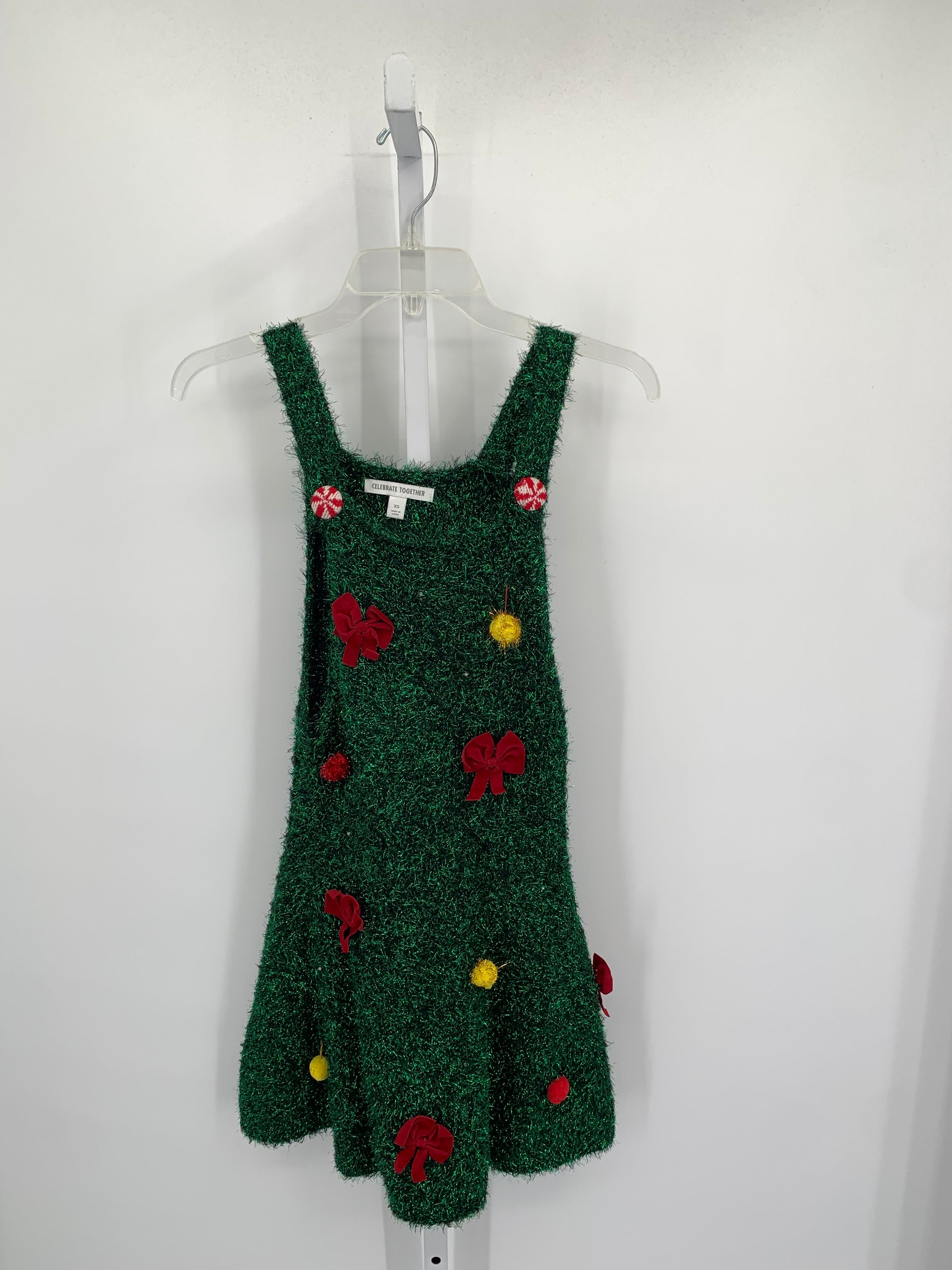 SLEEVELESS DRESS TINSEL RED BOWS.