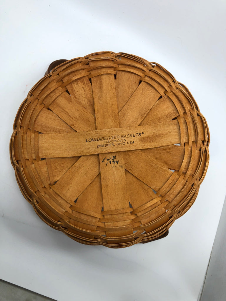 1994 ROUND BASKET W/LEATHER HANDLES.