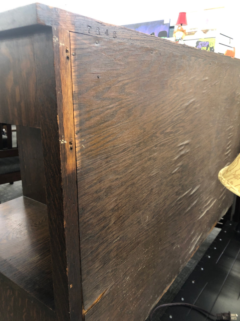 VTG LARGE BUFFET TABLE W 3 DRAWERS AND CABINET ON WHEELS.