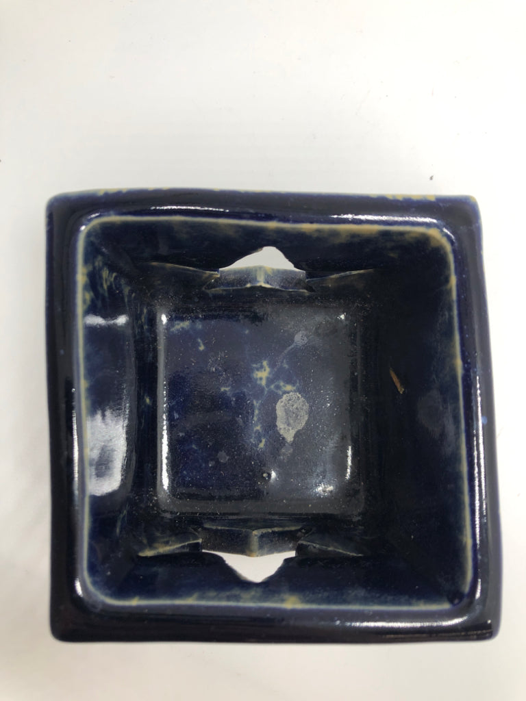 HEART CUT-OUT VOTIVE HOLDER.
