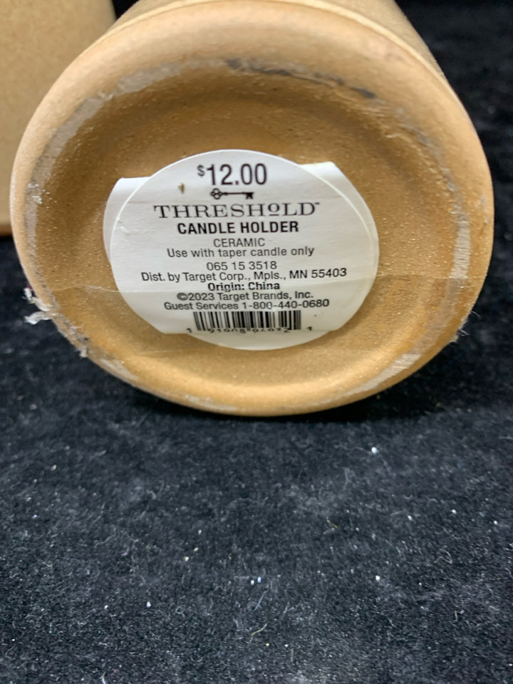 2 TAN CERAMIC TAPER CANDLE STICK HOLDERS.