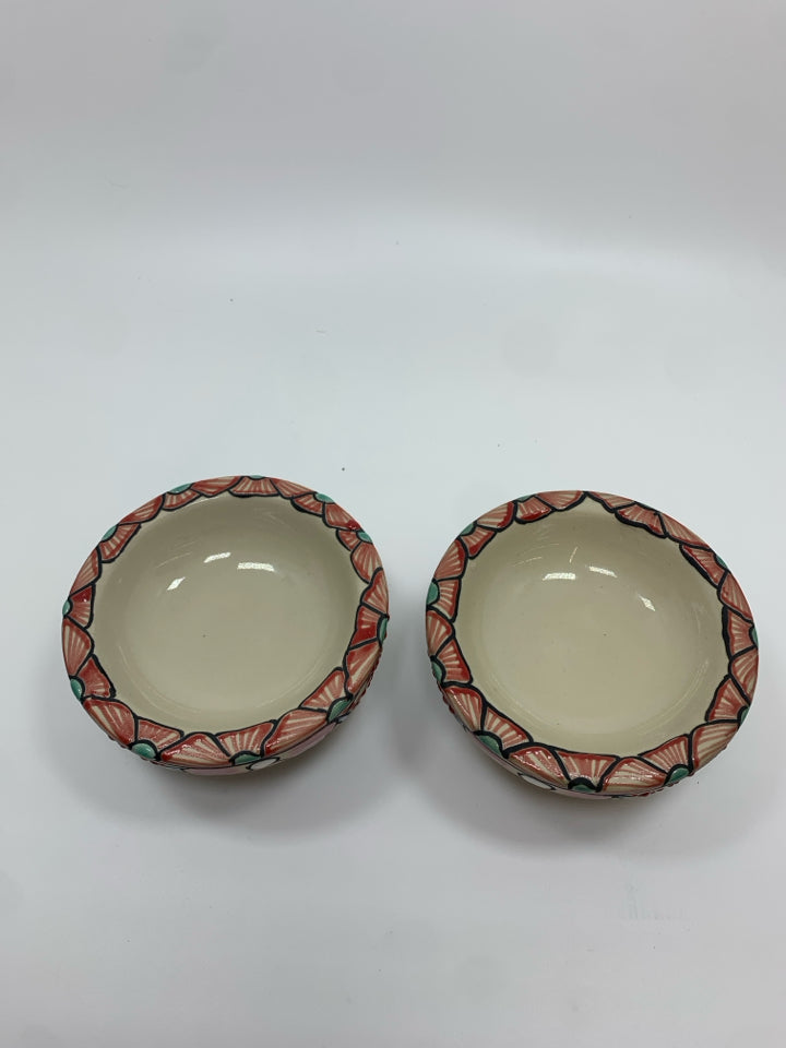 2 THREE LEGGED POTTERY SALSA BOWLS.
