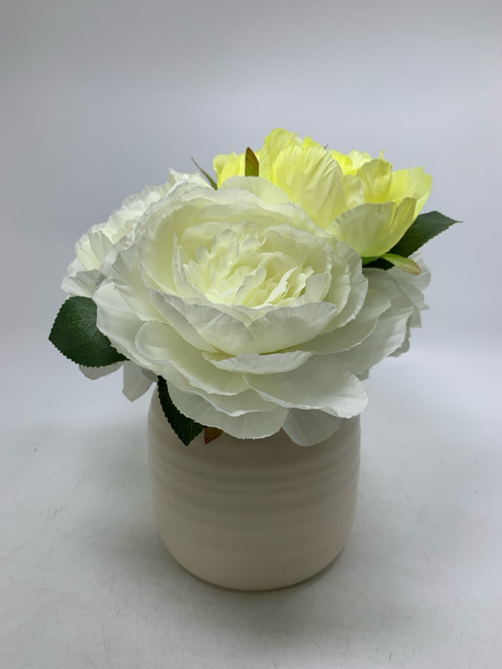WHITE PLANTER W/ FAUX WHITE FLOWERS.