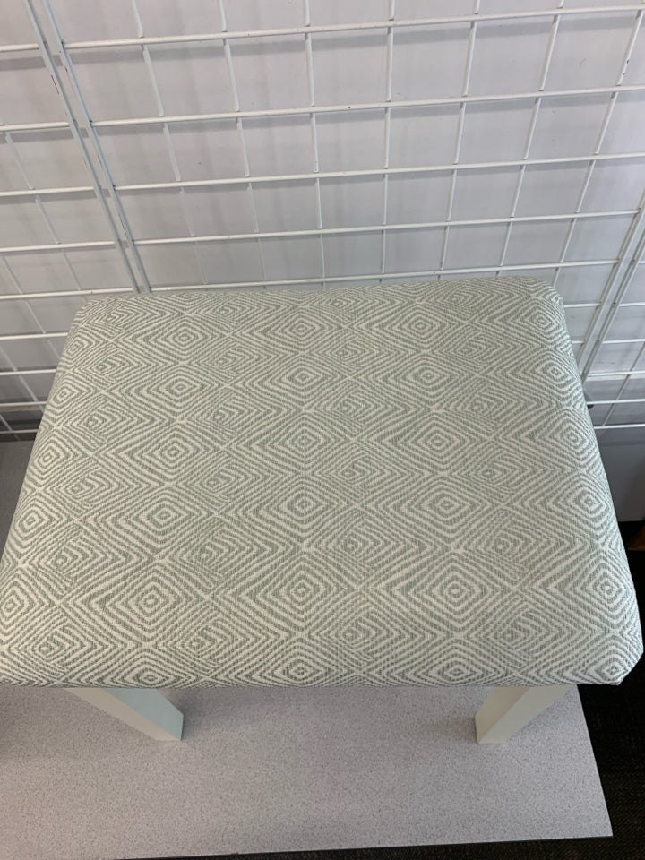 FOOT STOOL W/GEOMETRIC PATTERNED CUSHION.