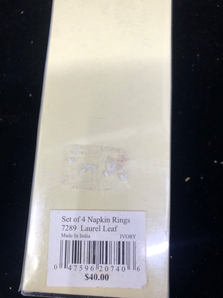 NIB 4 LENOX NAPKIN RINGS.