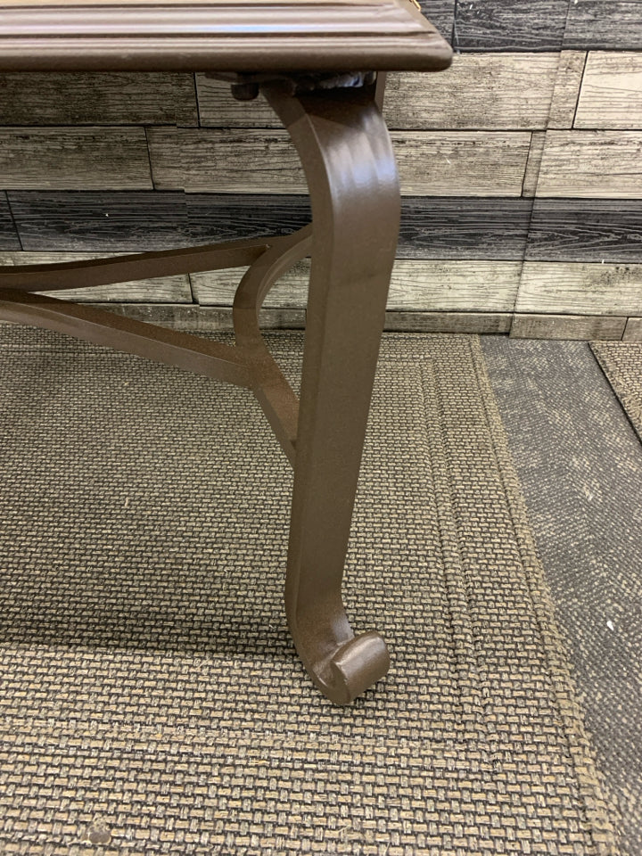 NEW BROWN METAL PATIO TABLE W STONE TOP.