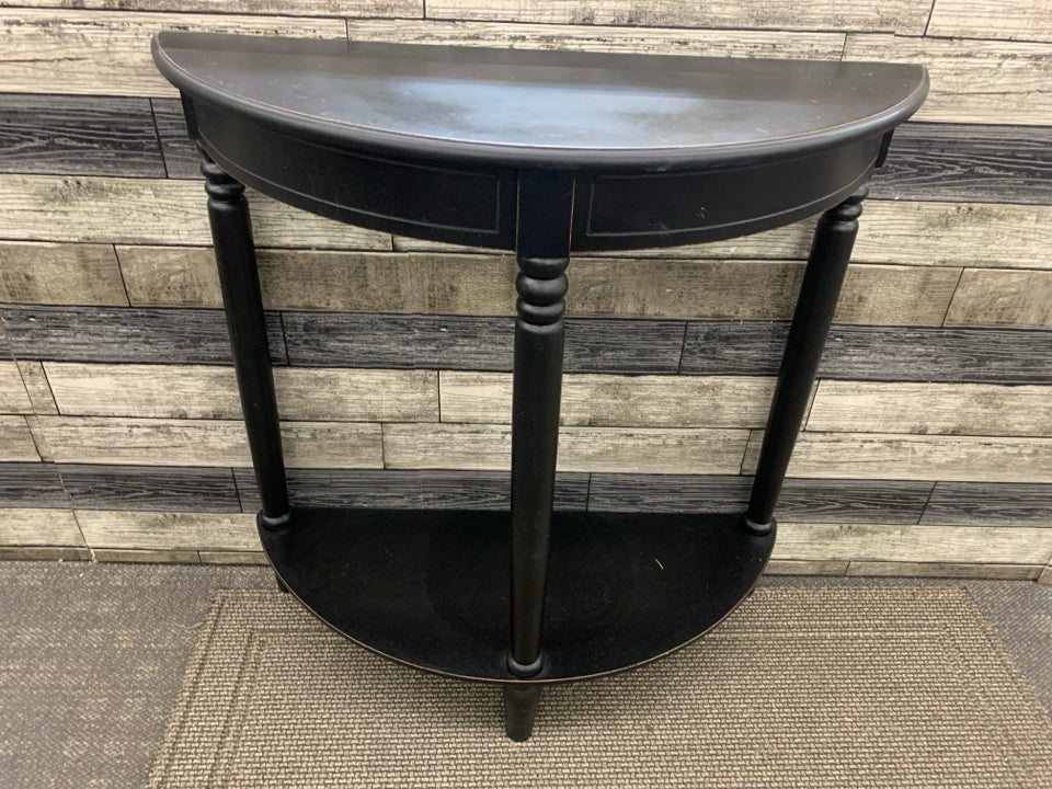 BLACK 2 TIER HALF MOON TABLE.