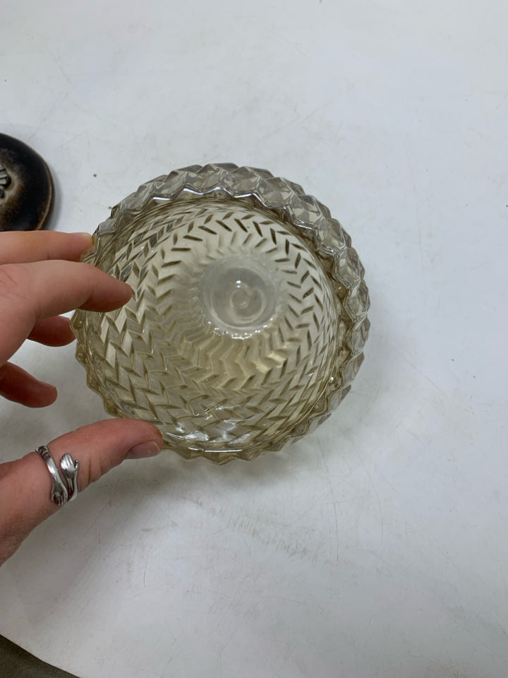 TEXTURED GLASS VASE W/ RESIN SCROLL LID.
