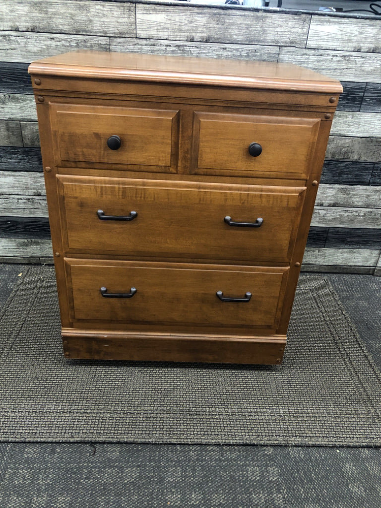 VTG WOOD SIDE TABLE W/3 DRAWERS ON WHEELS.