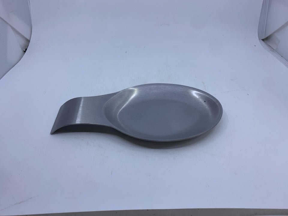 LARGE METAL SPOON REST.