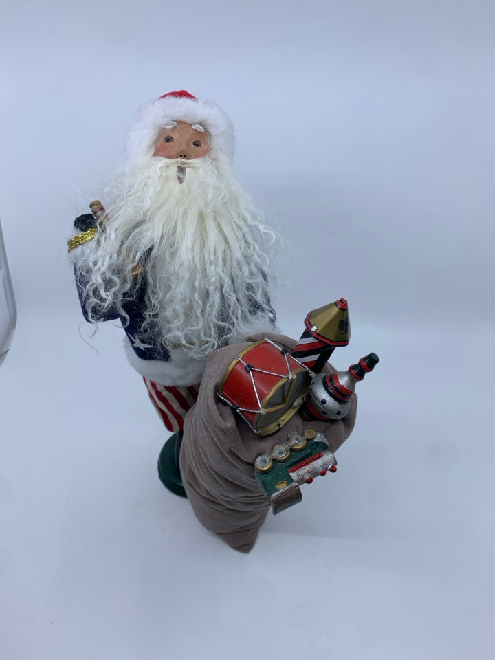 BYERS' CHOICE PATRIOTIC SANTA W TOYS.