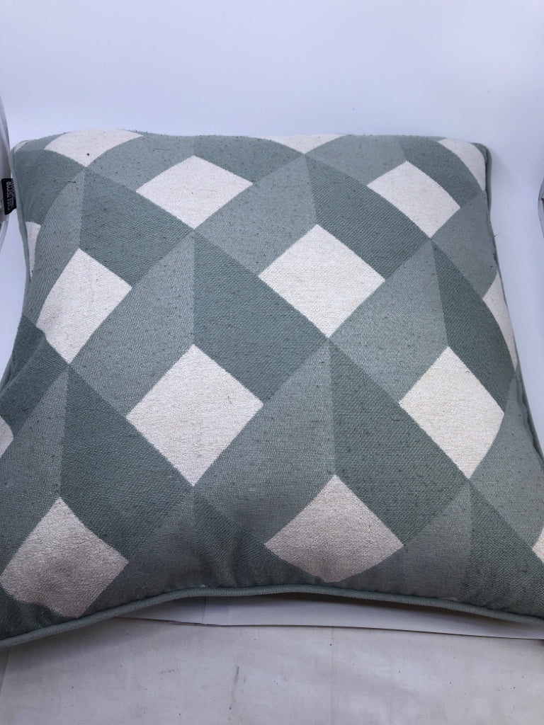 TEAL AND WHITE DIAMOND PATTERN PILLOW.