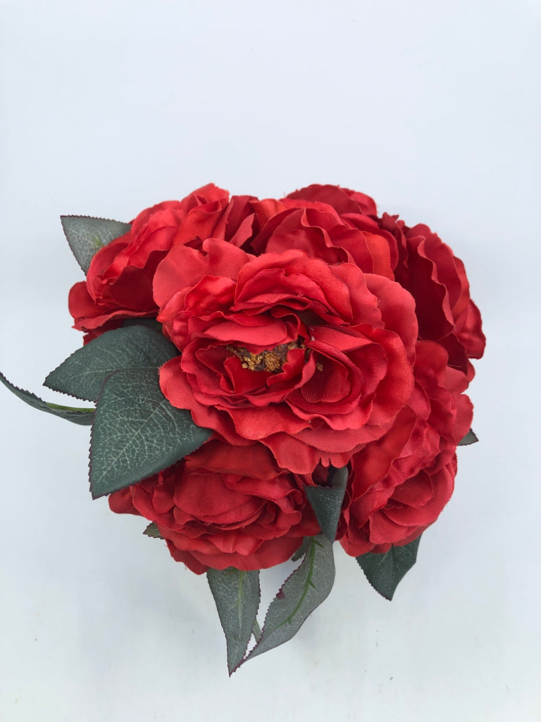 FOOTED BROWN METAL PLANTER W/ FAUX RED FLOWER BOUQUET.