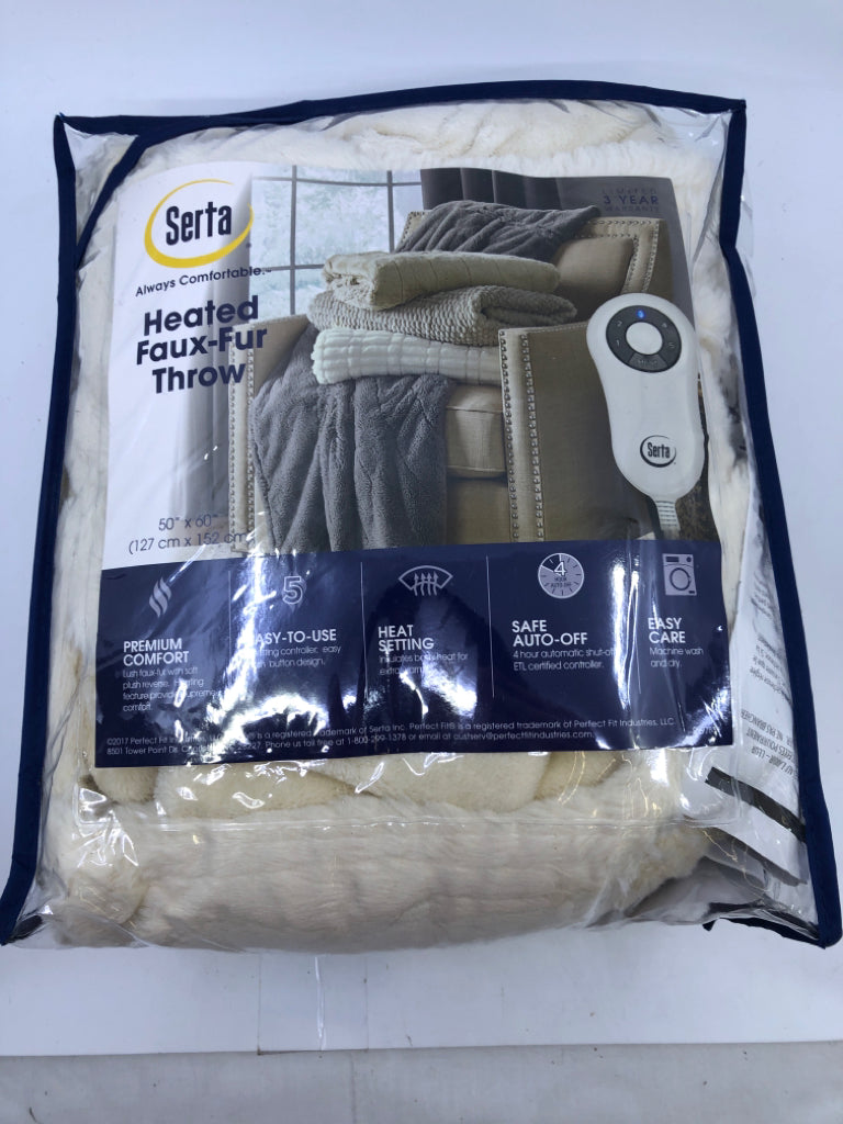 NIP CREAM HEATED FAUX FUR THROW.
