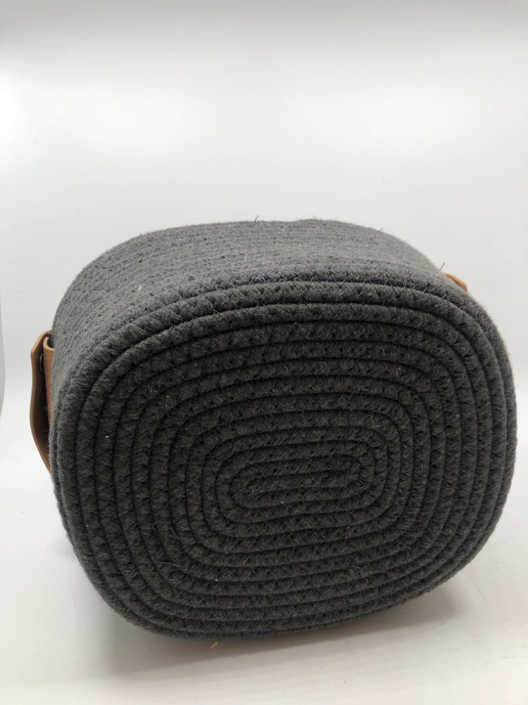 DK GREY FABRIC BIN W/FAUX LEATHER HANDLES.