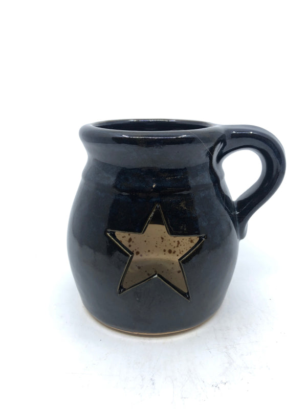 BLACK STAR JUG TEA LIGHT HOLDER.