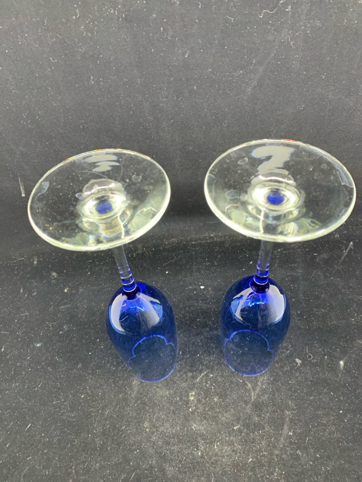 2 BLUE GLASS CLEAR STEM CHAMPAGNE FLUTES.