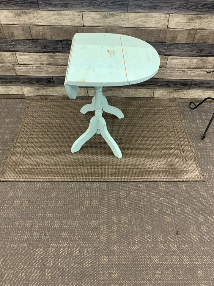 LIGHT BLUE OVAL DROP LEAF SIDE TABLE.