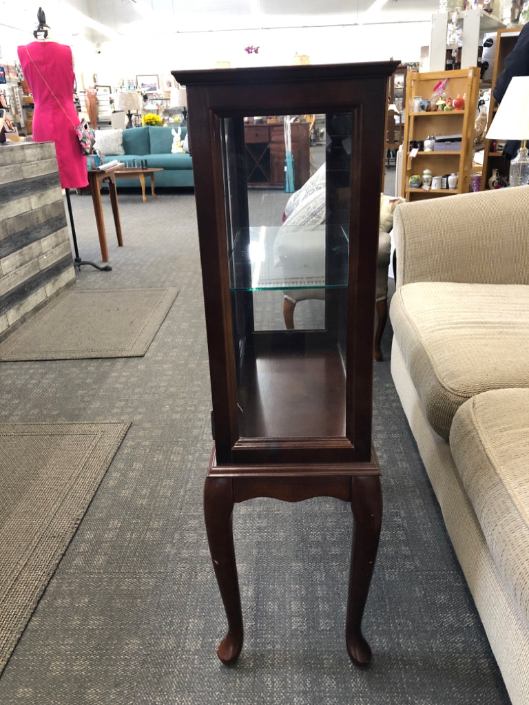 SMALL CHERRY WOOD CABINET W GLASS SHELVES AND DOORS.