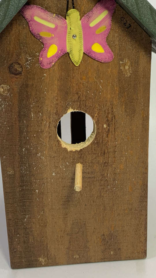 WOOD BIRDHOUSE W/BUTTERFLY DETAILS.