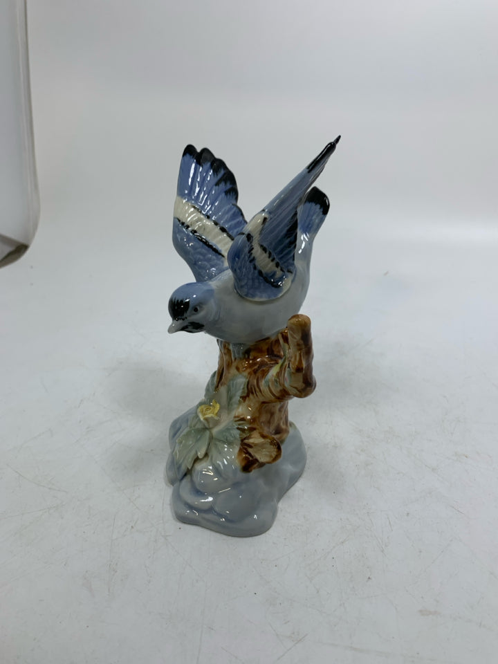 CERAMIC BLUE JAY ON BRANCH.