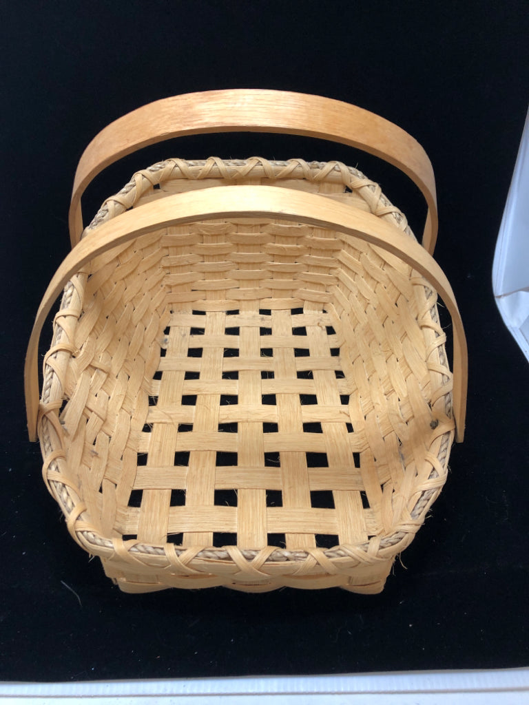 SLANTED BASKET W 2 WOODEN HANDLES.