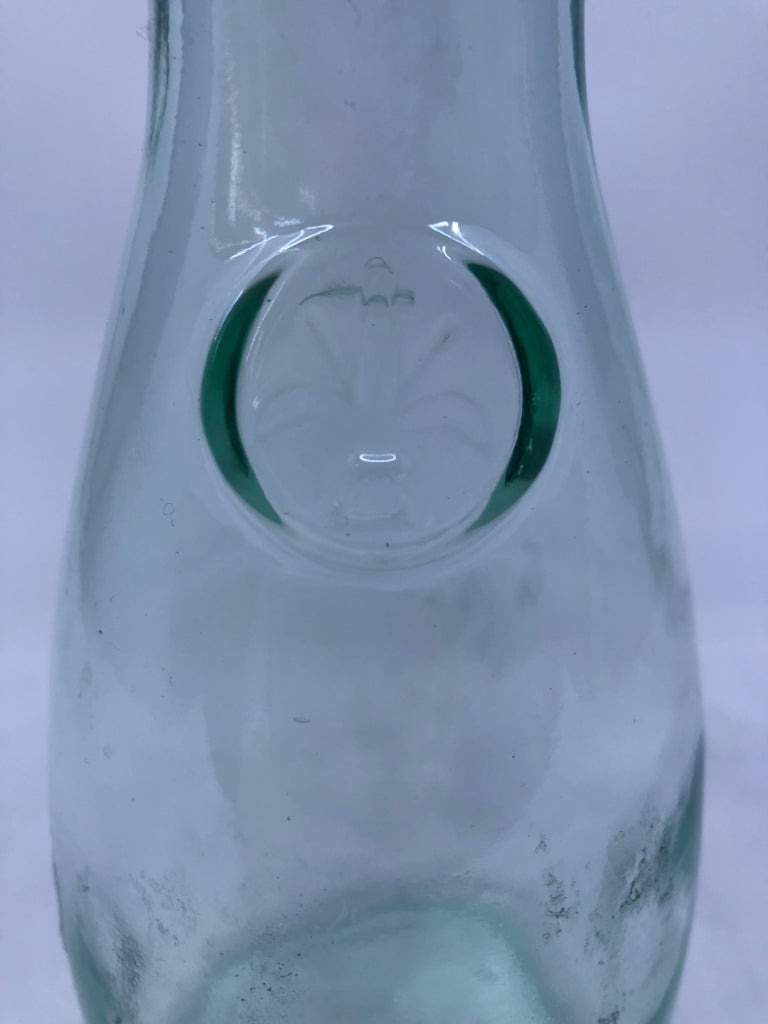 GREEN TINTED GLASS BOTTLE.