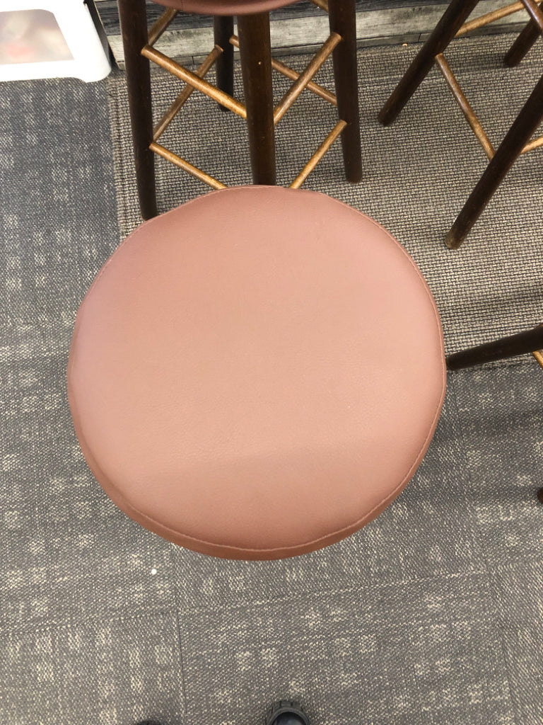 4 FAUX LEATHER BAR STOOLS.