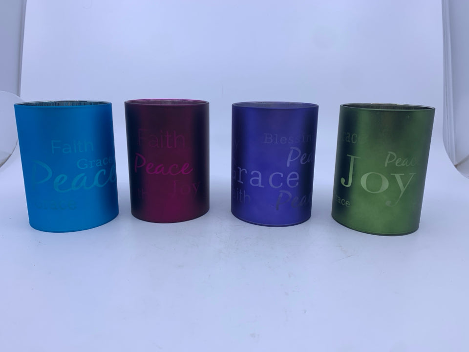 4 FLAMELESS CANDLES MULTI COLORED.