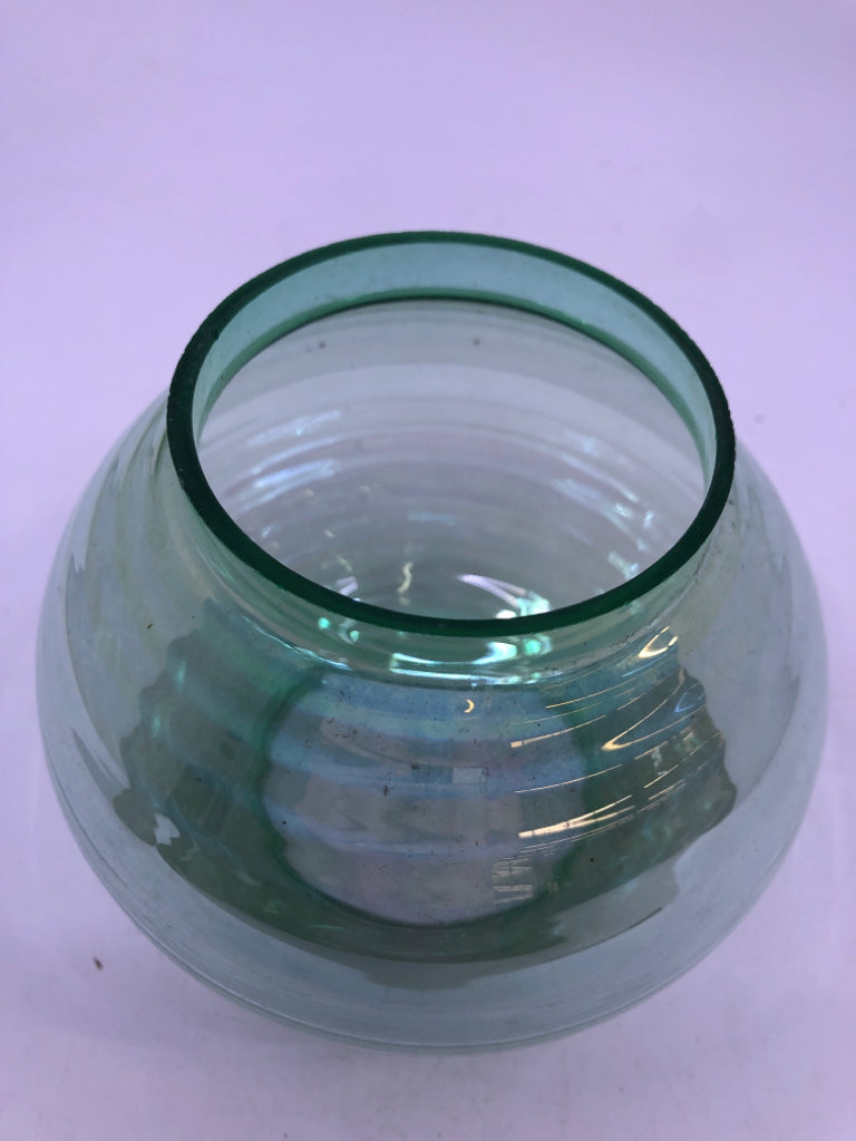 PEWTER BASE TAPERED CANDLE HOLDER W/ GREEN IRIDESCENT GLASS SHADE.