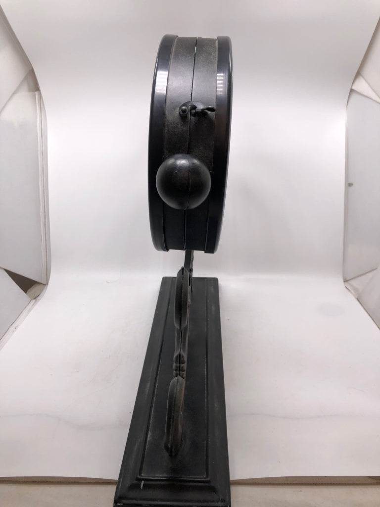 BRUSHED METAL SCROLL SHELF CLOCK.