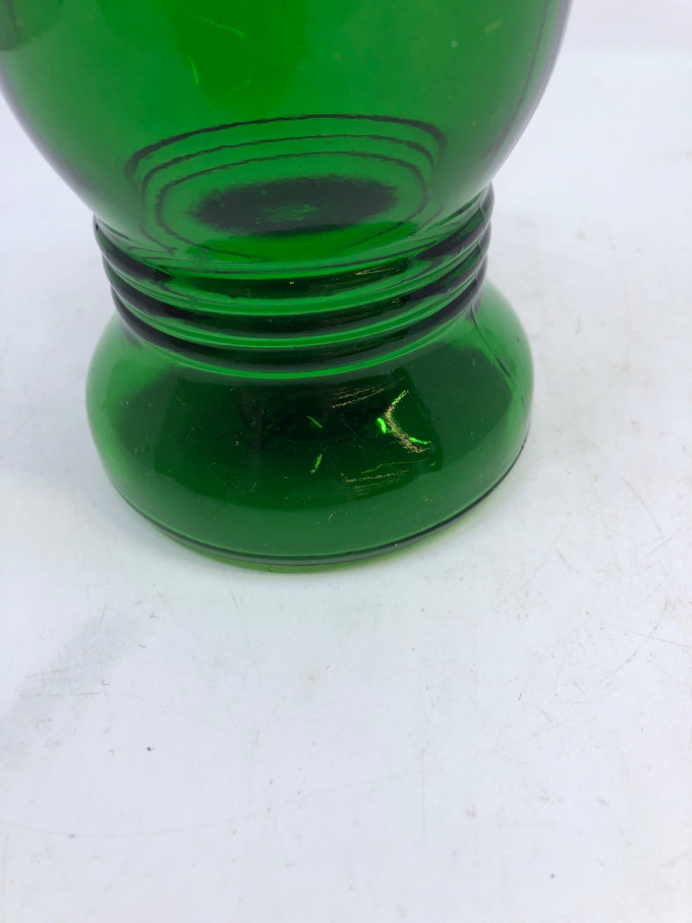 FOOTED GREEN GLASS VASE.