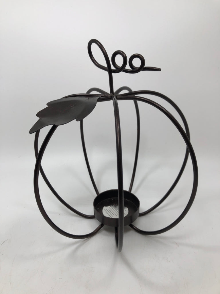 BROWN METAL PUMPKIN CANDLE HOLDER.