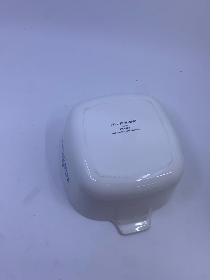 WHITE CASSEROLE DISH WITH BLUE FLORAL.