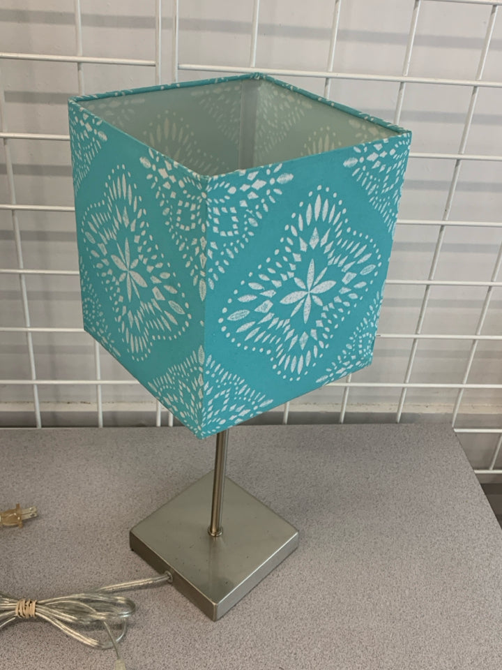 SILVER LAMP W/SQUARE TEAL SHADE.