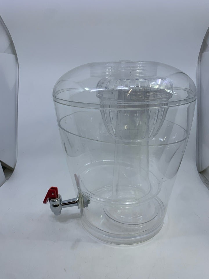 PLASTIC ROUND DRINK DISPENSER W/ ICE HOLDER.