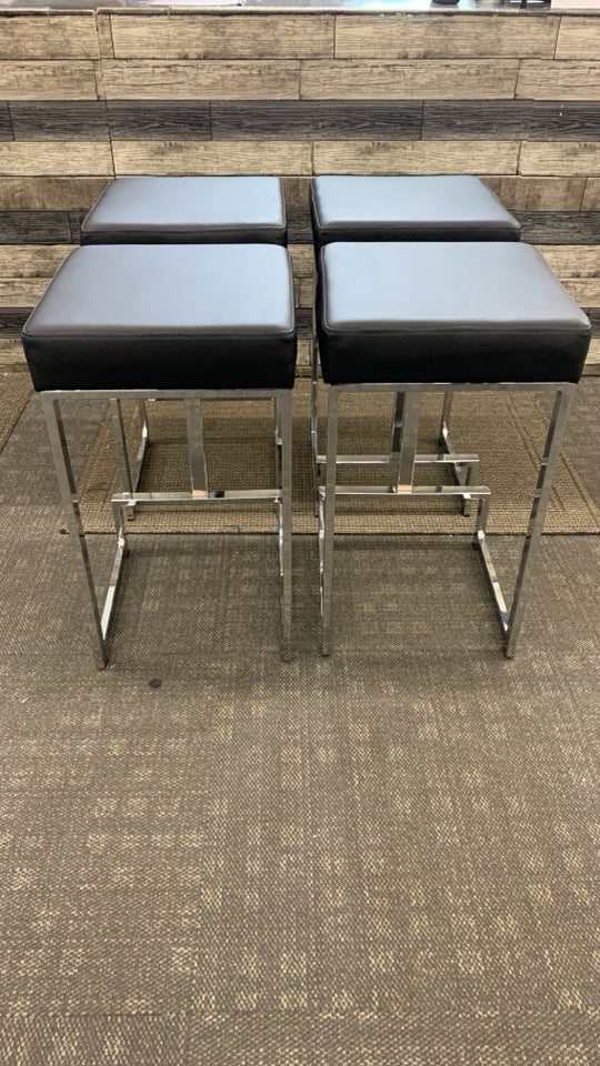 4 CHROME SQUARE STOOLS W/BLACK FAUX LEATHER SEAT.
