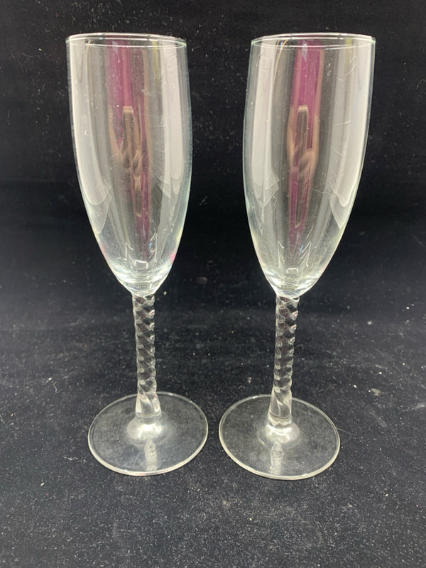 2 SWIRLED STEM CHAMPAGNE GLASSES.