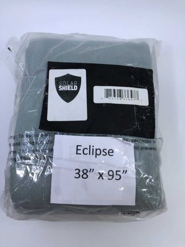 NIP TEAL ECLIPSE CURTAINS.