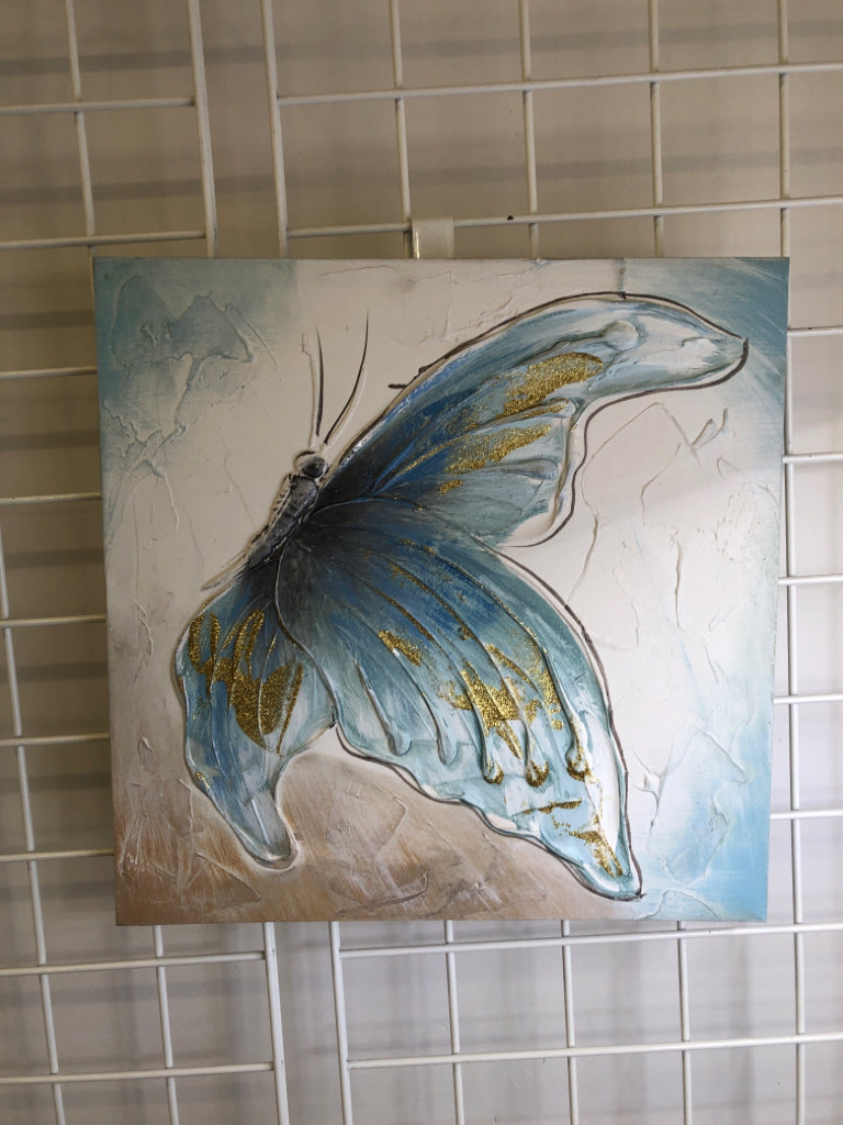 BLUE BUTTERFLY PAINTED CANVAS.