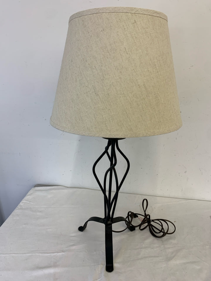 BLACK SCROLL BASE LAMP W TAN/CREAM SHADE.