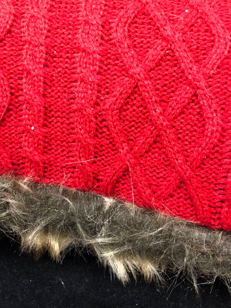 RED SWEATER PILLOW W/ FAUX FUR EDGE.