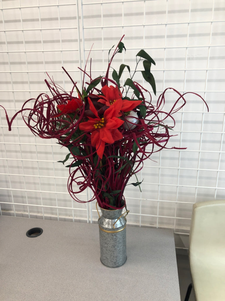 POINSETTIA /WINTER PIP IN GALVANIZED BUCKET.