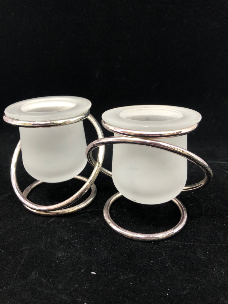 INTERTWINED METAL FROSTED GLASS TEALIGHT CANDLE HOLDER.