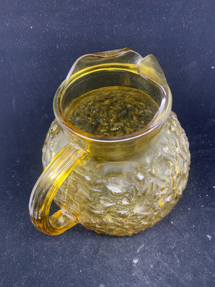 VTG AMBER GLASS TEXTURED PITCHER ICE LIP.