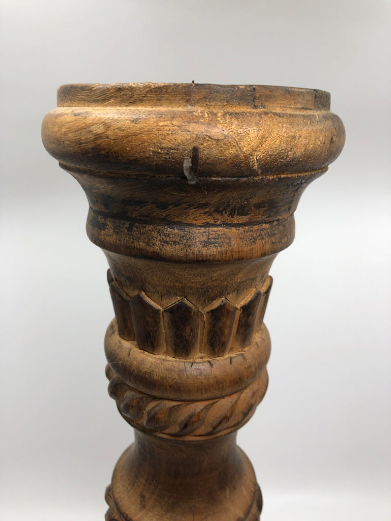 2 WOOD CARVED CANDLE HOLDERS W/BURNT FINISH.