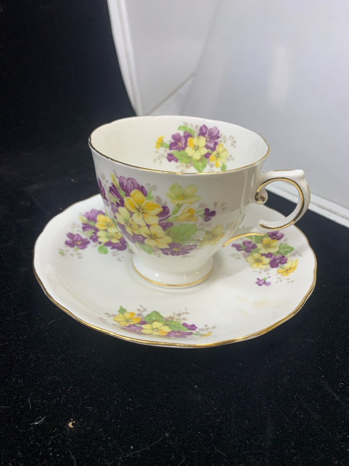 VTG WHITE W/YELLOW PURPLE FLORAL TEA CUP & SAUCER.