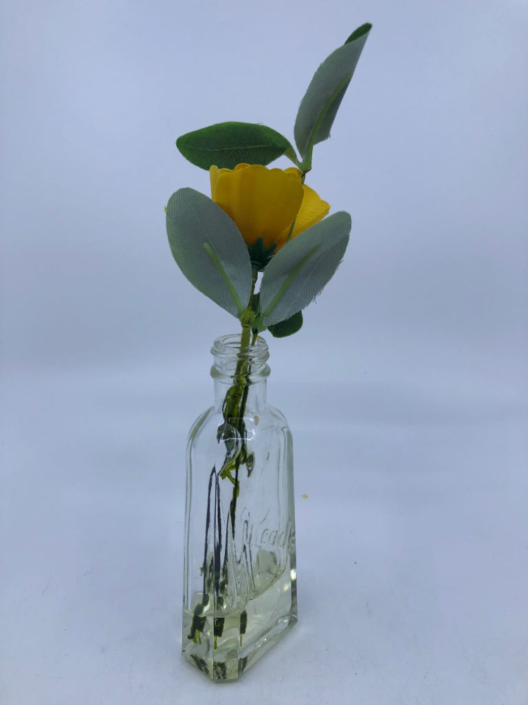 FAUX YELLOW FLOWER IN GLASS VASE.